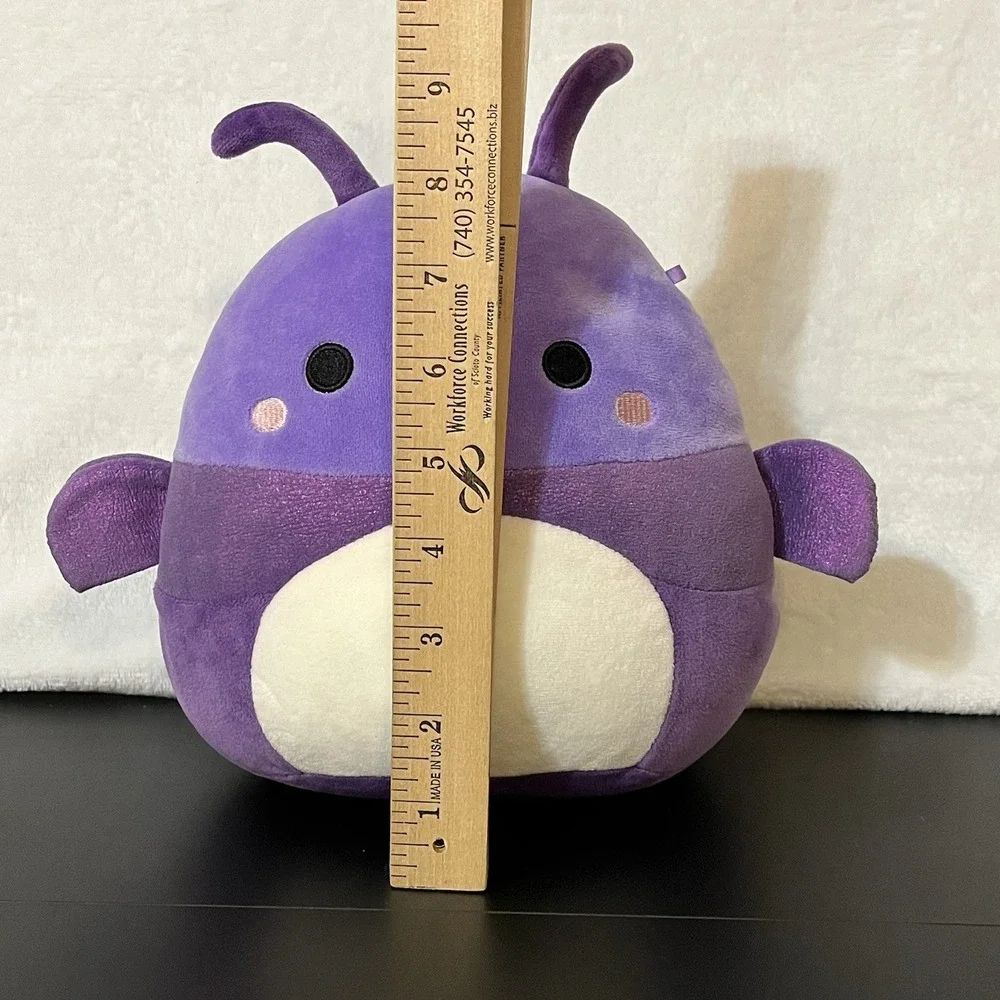 Squishmallows axel purple